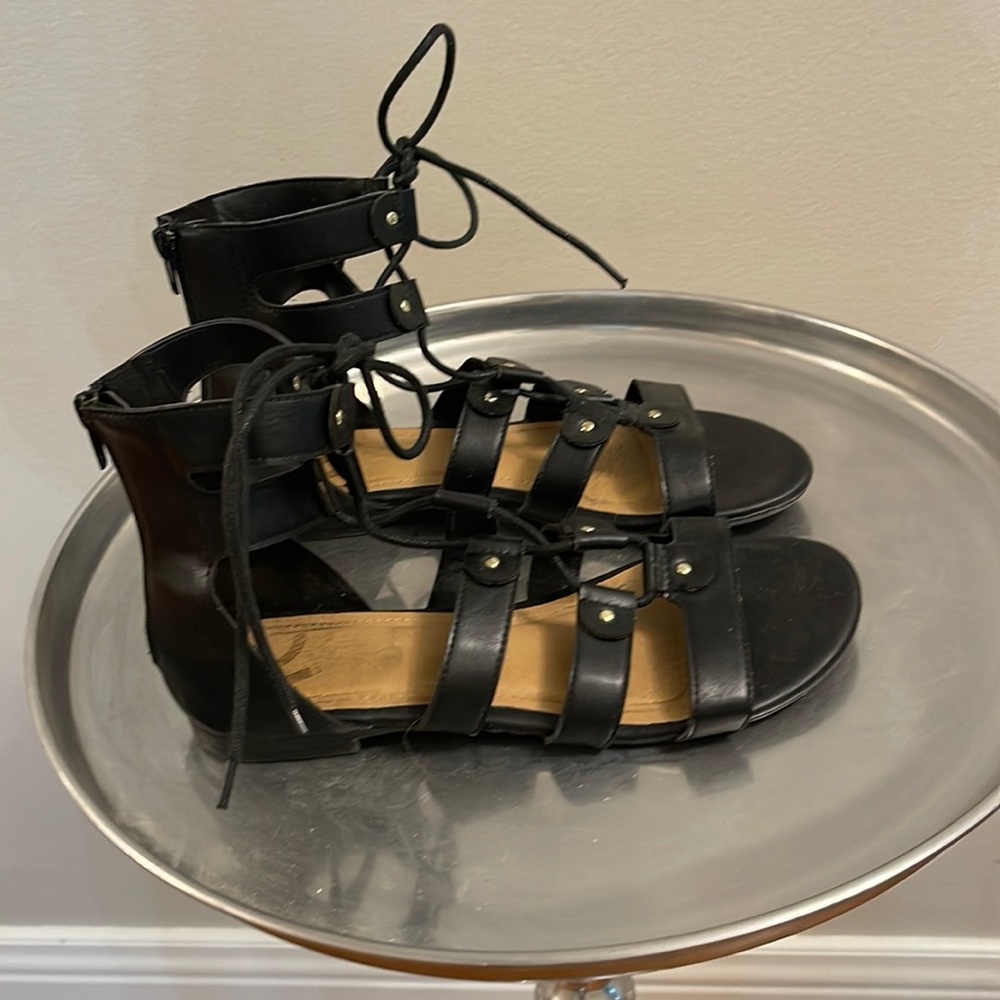 Black leather gladiator sandals. Great used pair of sandals! Size 7